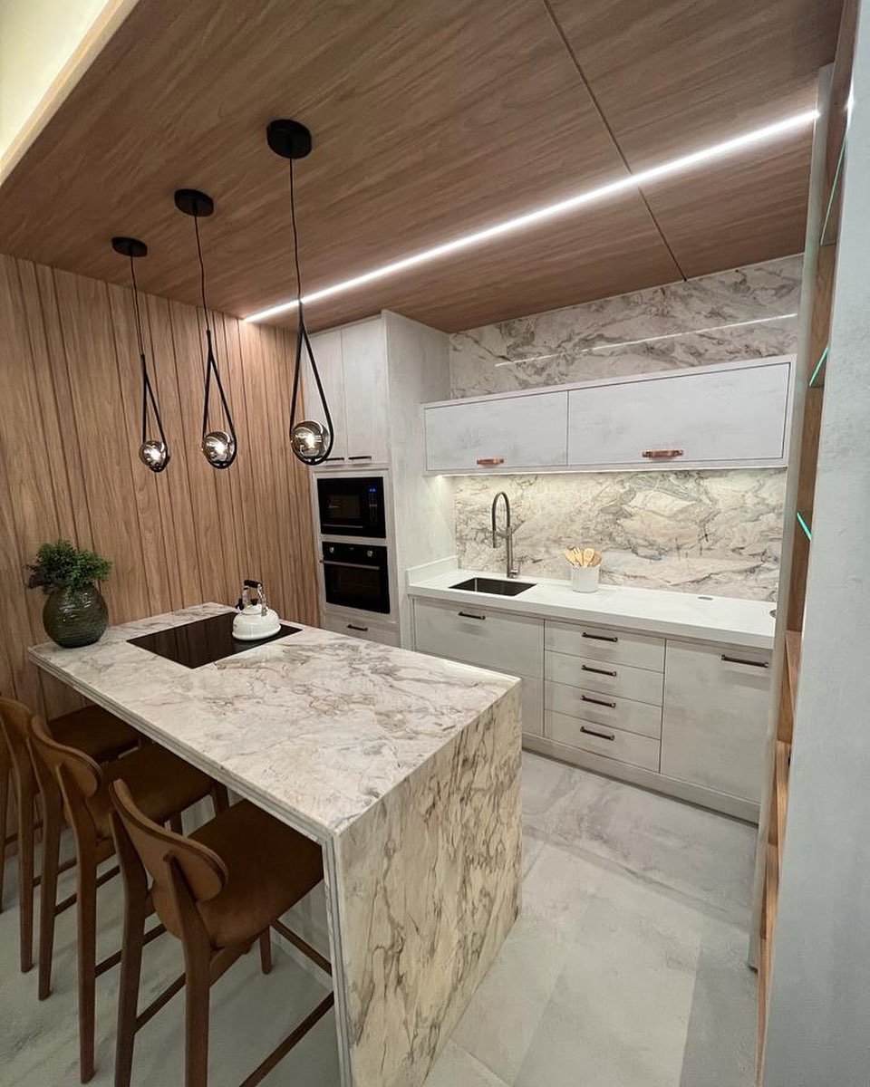 Cozinha gourmet com ilha em quartzito